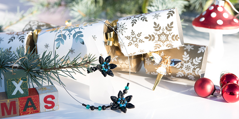 Necklace and ring on a christmas table