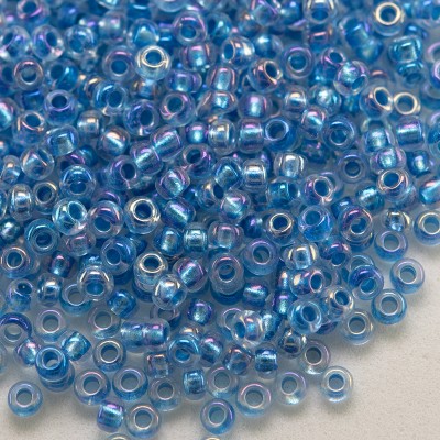 Preciosa Czech glass seed bead 11/0 Clear glass Blue metallic lined with a rainbow coating
