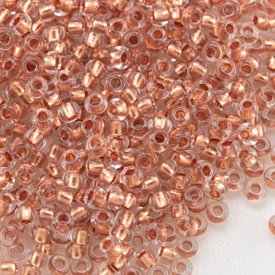 Preciosa Czech glass seed bead 11/0 Clear glass Copper Lined