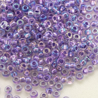 Preciosa Czech glass seed bead 11/0 Clear glass Purple metallic lined with a rainbow coating