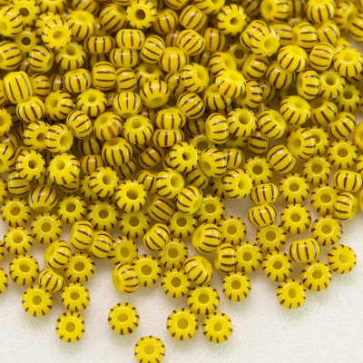 Preciosa Czech glass seed bead 11/0 Opaque yellow with black pinstripe