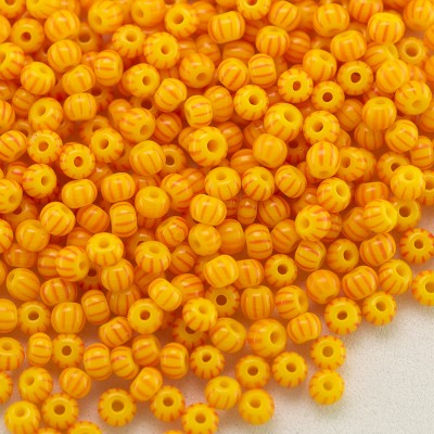 Preciosa Czech glass seed bead 11/0 Opaque yellow with Red pinstripe