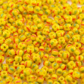 Preciosa Czech glass seed bead 11/0 Opaque yellow with Red & Green pinstripe