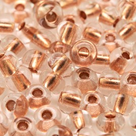 Preciosa Czech glass seed bead 5/0 Clear glass Copper Lined