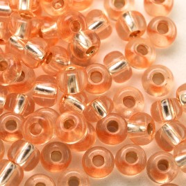 Preciosa Czech glass seed bead, size 5/0 Peach silver Lined
