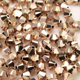 Swarovski 5328 Xilion Bead 4mm Crystal Rose Gold2x Bicone
